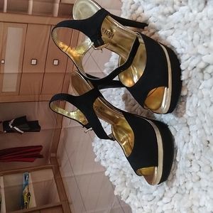 Women's gold and black platform stiletto heels